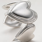 Bague double cœurs lisse