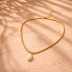 Collier perle doré