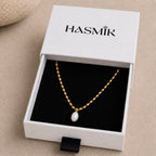 Collier perle doré